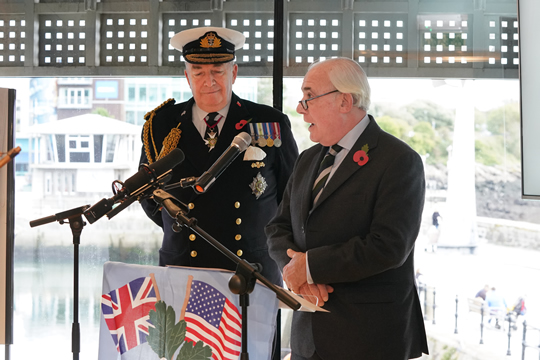 William Alden MBE presents the scroll